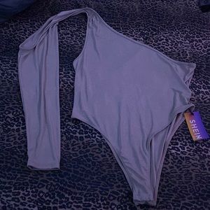 Gold body suit from shein. It’s a 2XL, never worn. tag still attached